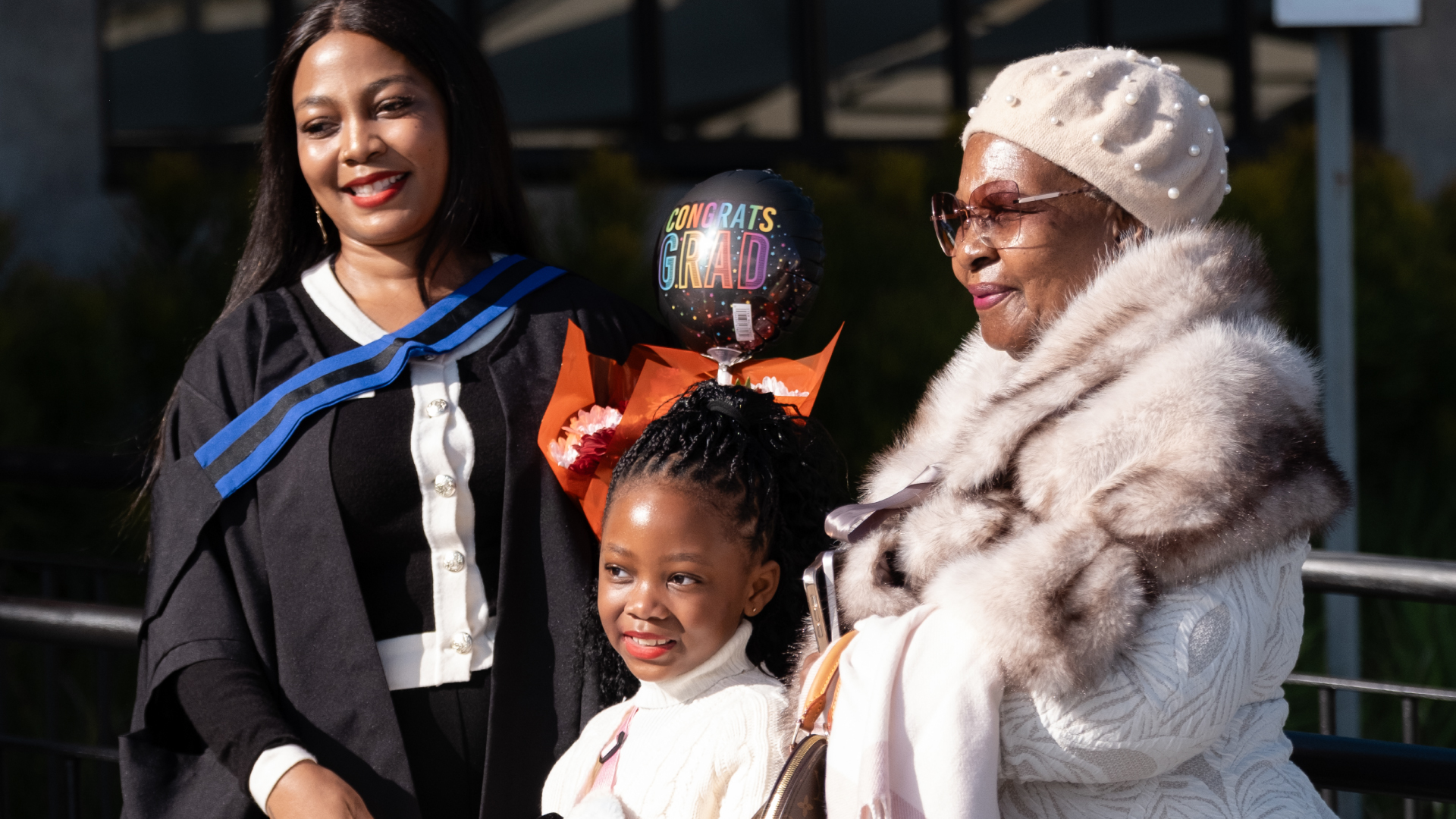 iQ Academy: Making Education Accessible in South Africa 9 South African graduate celebrating an education milestone with family